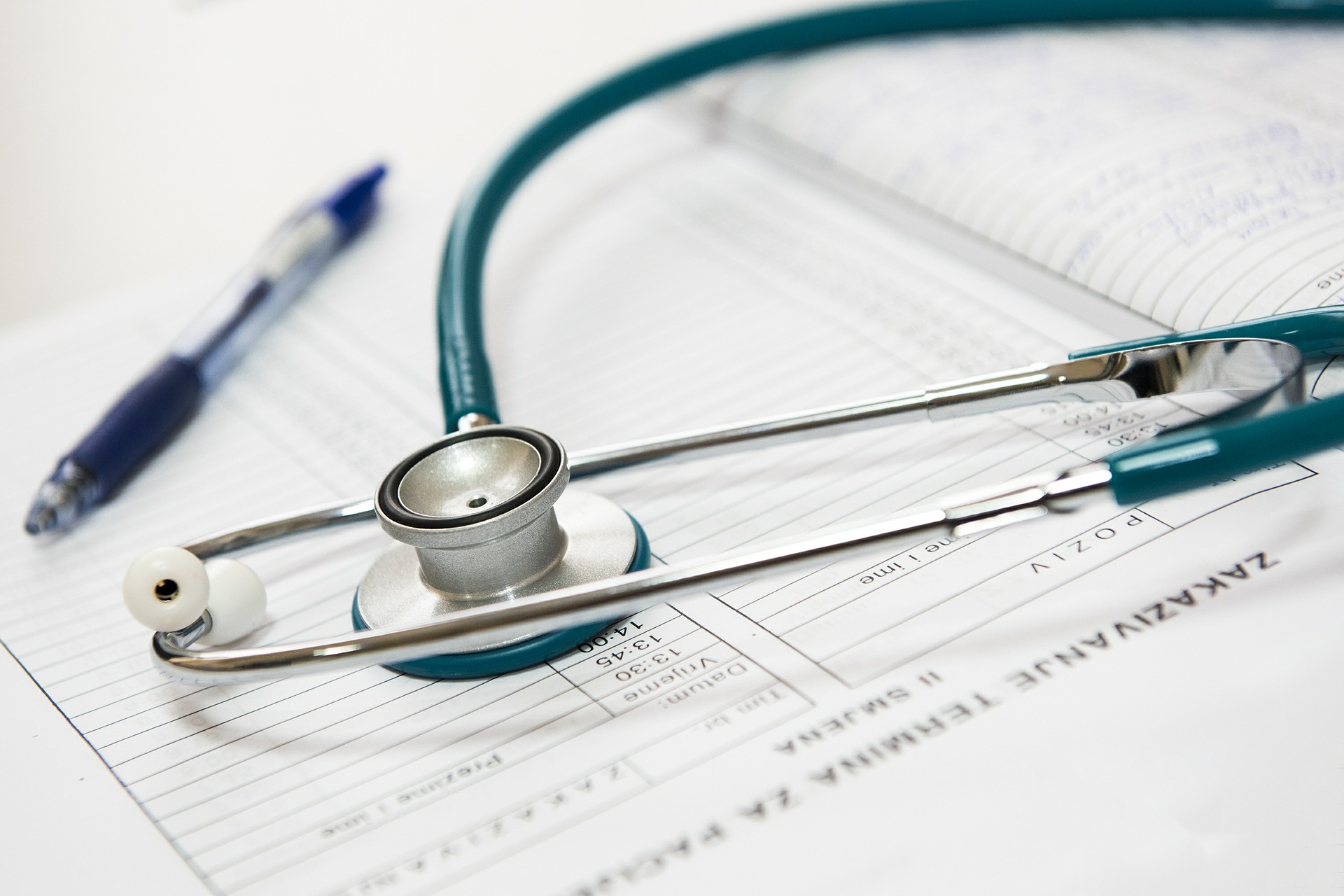Stethoscope on top of an appointment list